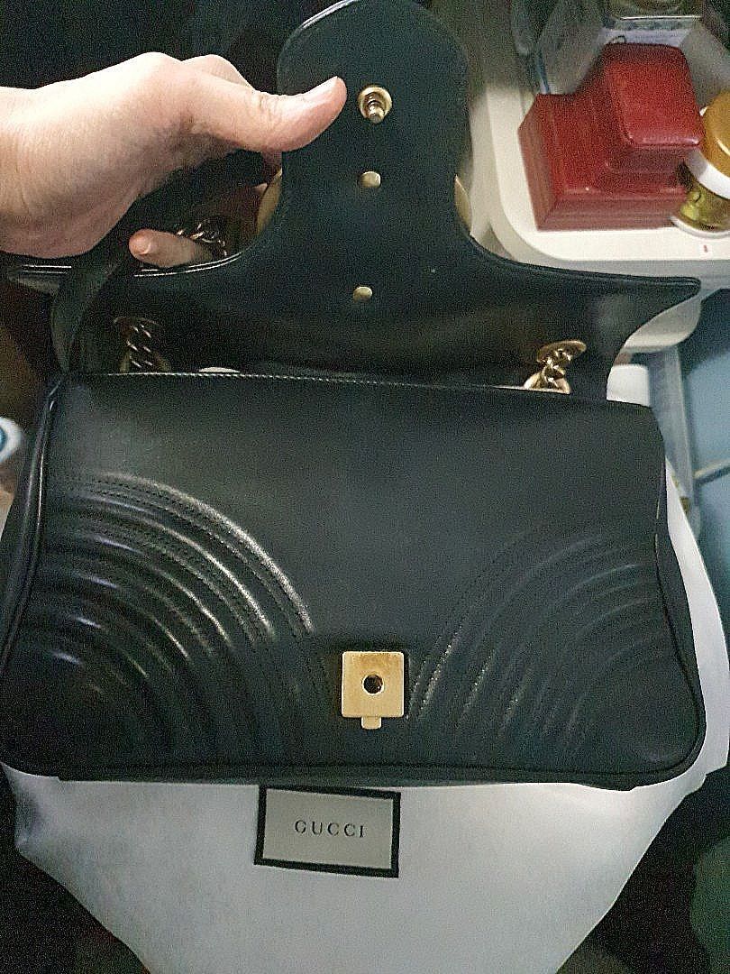 AUTHENTIC GUCCI Marmont Medium (Category: Luxury Bags & Wallets) located in Pasig City. Submitted by preloved_ramen21 (Listing ID 1316140316, Image 3). Description: BRAND: GUCCI SIZE: Medium CONDITION: Well used Inclusions: dustbag brand cards receipt.