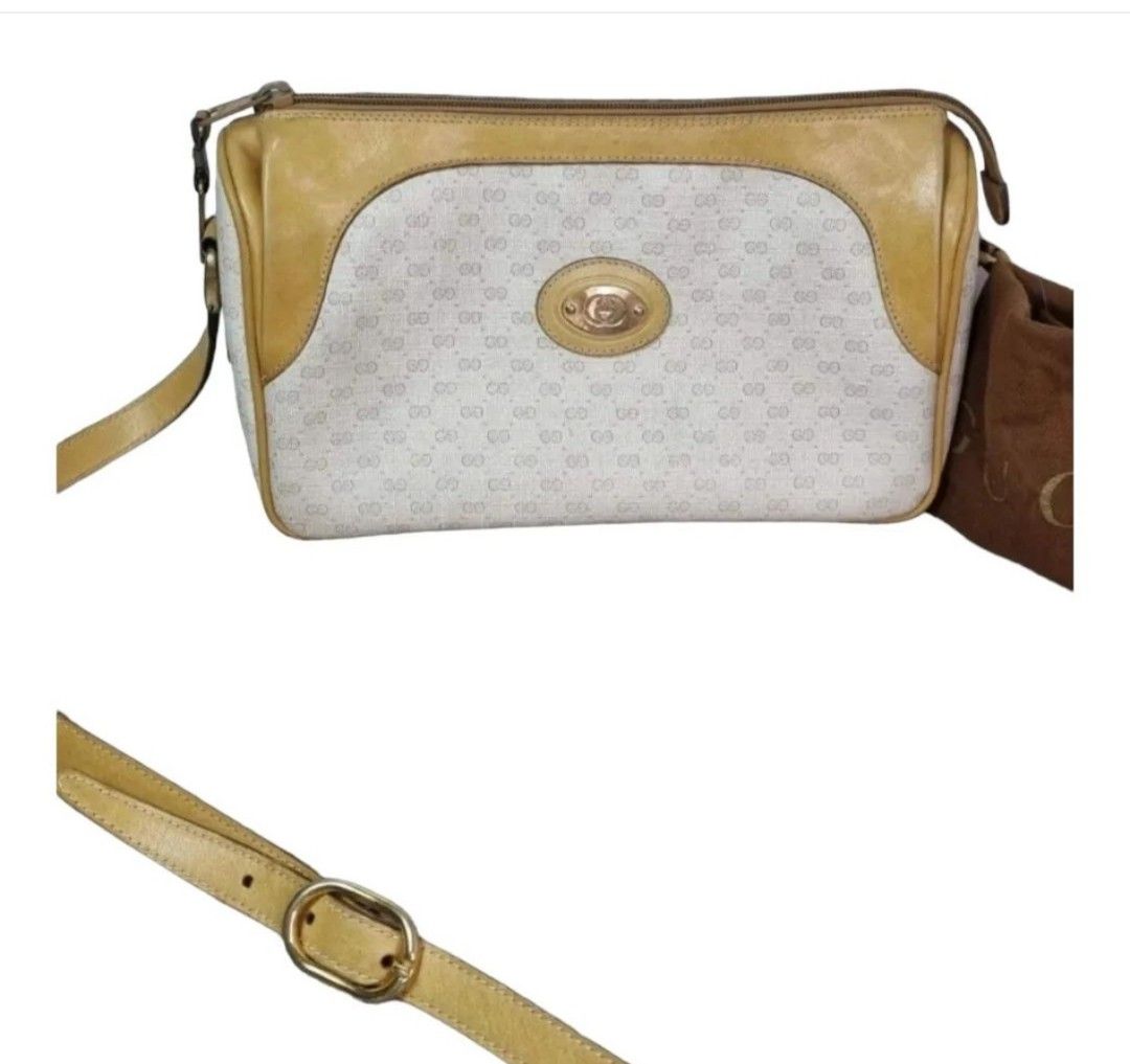 Authentic GUCCI Sling bag (Category: Luxury Bags & Wallets) located in Quezon City. Submitted by maneradesignersboutique (Listing ID 1317001247, Image 1). Description: Money back Guarantee 💯% Guaranteed authentic *Brand: GG sling bag *Materials: MONOGRAM PVC *Color: off white moo *Size: small *Condition: 8/10 never been spa -Used * Inclusions: dustbag All items purchased from manera has less 30% Discount in restoration lifetime. Rank review by t