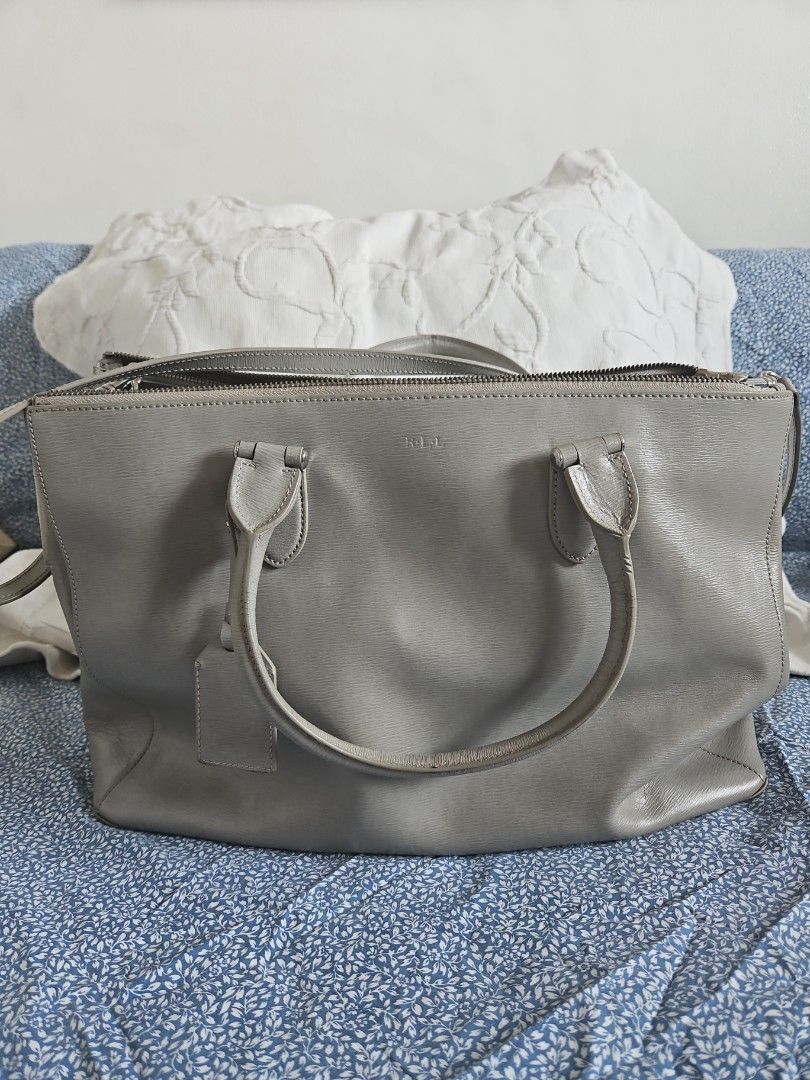 Authentic Ralph Lauren Bag (Category: Luxury Bags & Wallets) located in Paranaque City. Submitted by gonethrifting (Listing ID 1316855531, Image 1). Description: Gray Large Bag authentic RL Bag Can fit laptop Useful as office/corporate.