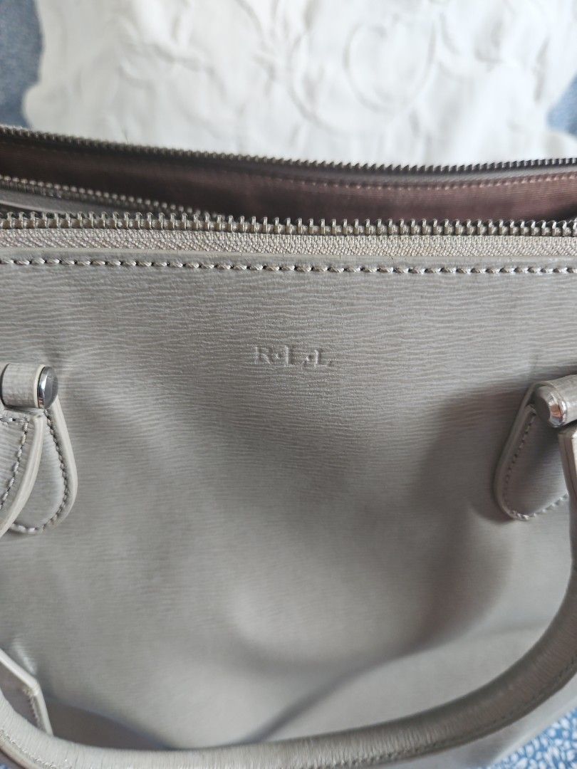 Authentic Ralph Lauren Bag (Category: Luxury Bags & Wallets) located in Paranaque City. Submitted by gonethrifting (Listing ID 1316855531, Image 3). Description: Gray Large Bag authentic RL Bag Can fit laptop Useful as office/corporate.