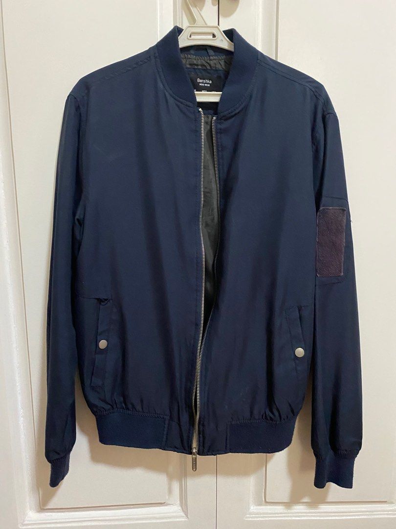 Bershka bomber jacket (Category: Coats, Jackets and Outerwear) located in Manila. Submitted by francoo7 (Listing ID 1316823276, Image 1). Description: Bershka bomber jacket (navy) Size: Small.