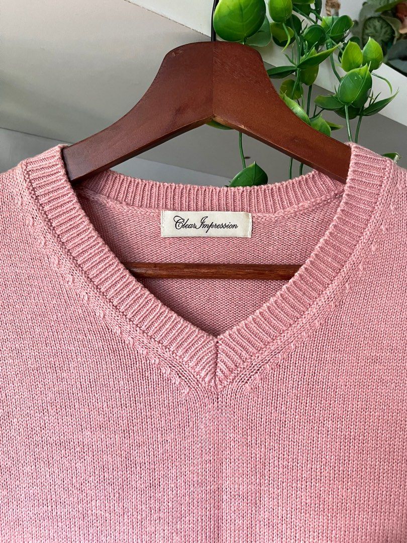 Dusty pink knitwear store