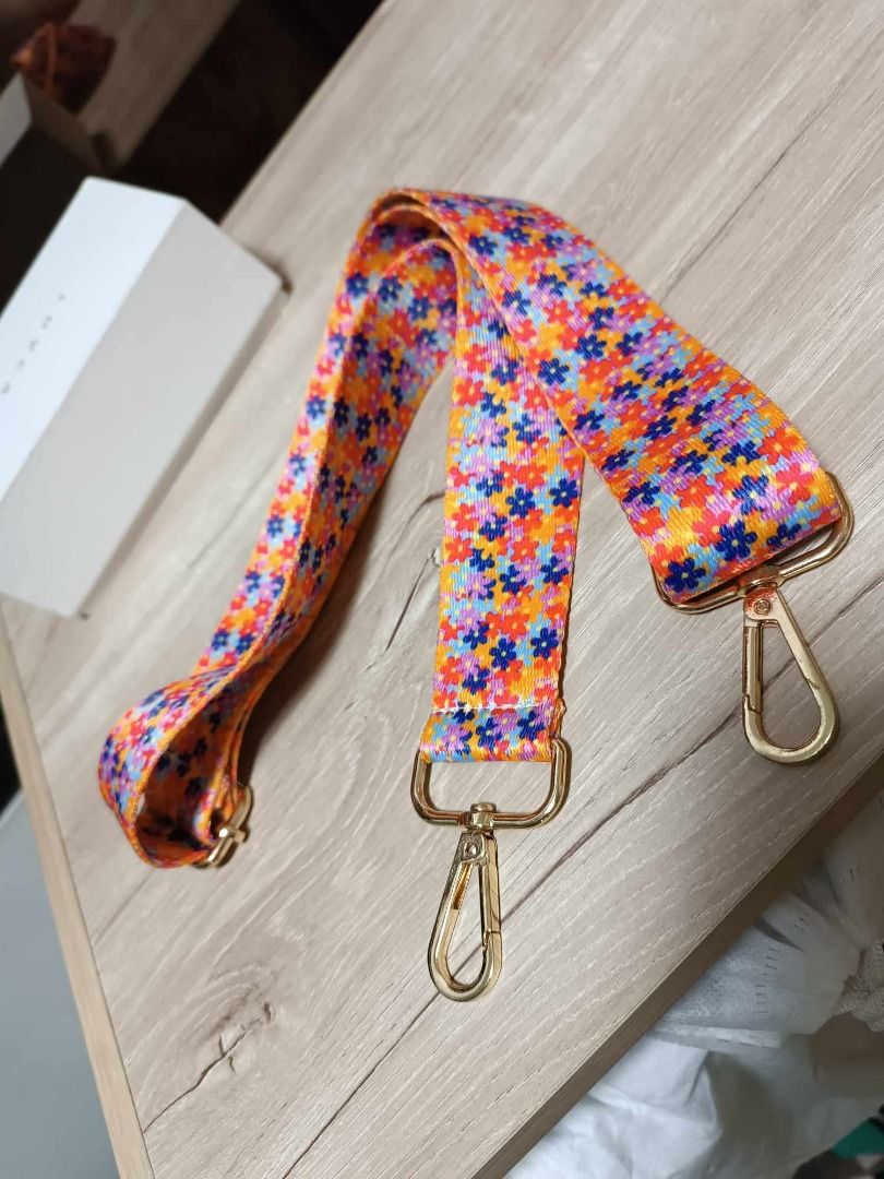 New floral wide strap for sling bag (Category: Cross-body Bags) located in Quezon City. Submitted by ladyJR (Listing ID 1316975224, Image 1). Description: New floral wide strap for sling bag Never use - no issue Bought in Shop3e for P180 Rfs: Need funds Do not make an offer if not sure buyer!! Payment method: GCash, or Bank transfer MOD: Lalamove (within metro manila), J&T, Flash express Meet up on selected location only.