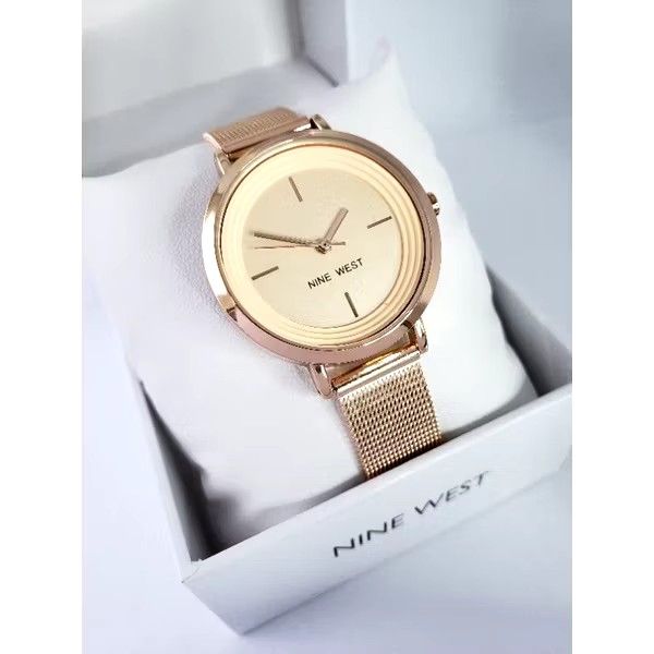 ORIGINAL Nine West Rosegold watch (Category: Women's Watches) located in Manila. Submitted by pingkaysf (Listing ID 1316850943, Image 1). Description: For sale : Original Nine West Rosegold Watch Bought from US online seller "The Chicberry" you may find them on FB for legitimacy of their products. RFS : I have 3 Rosegold color of watches..