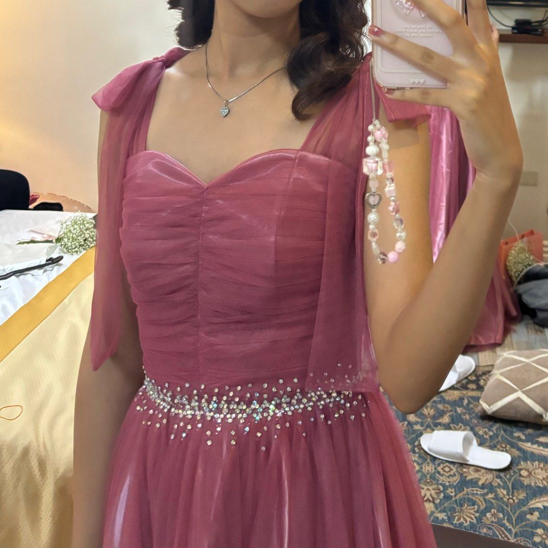 Pink bridesmaid gown with slit (Category: Evening dresses & gowns) located in Taguig. Submitted by dblnpat (Listing ID 1316847674, Image 2). Description: Bridesmaid gown in pink Size Ref: 5’4 height + 1.5 inch heels 30-32” bust 24” waist 54.5” length from shoulder to bottom With slit Once worn only Rfs: served its purpose.