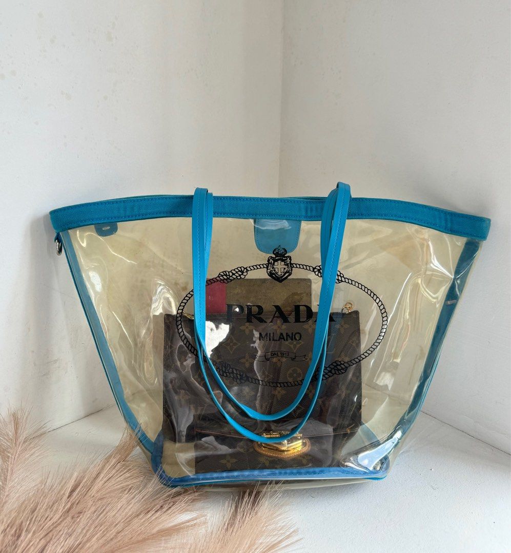 PRADA TRANSPARENT TOTE PVC (Category: Luxury Bags & Wallets) located in Cagayan de Oro. Submitted by moiobsession (Listing ID 1316919525, Image 2). Description: authentic with minor stains. tags and white tag intact. .