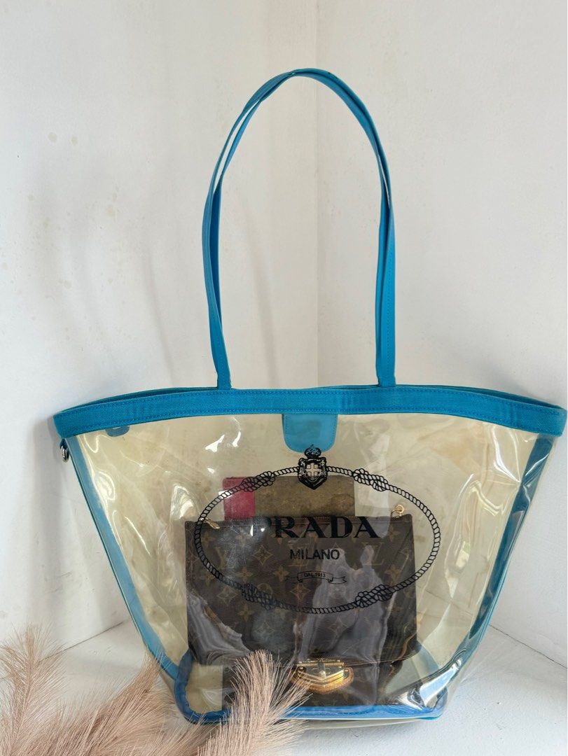 PRADA TRANSPARENT TOTE PVC (Category: Luxury Bags & Wallets) located in Cagayan de Oro. Submitted by moiobsession (Listing ID 1316919525, Image 3). Description: authentic with minor stains. tags and white tag intact. .