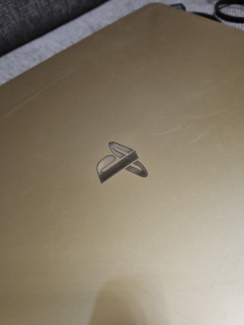 PS4 GOLD SLIM (Category: PlayStation) located in Las Pinas. Submitted by chaaaayan (Listing ID 1316928448, Image 3). Description: ☁️ still available, just message 🌷 looking for sure buyer! Selling console AND controller ONLY Please read below 👇 - 11.0 SYSTEM FIRMWARE - 400GB STORAGE - NO JAILBREAK Inclusions as is: - console - console cord (TYPE G plug) - controller cord - 1pc controller - controller stand/charger Flaws: - scratches - dirt/grim