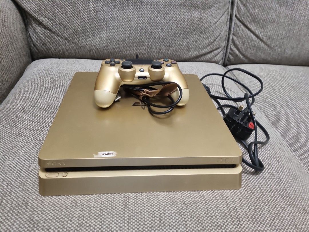 PS4 GOLD SLIM (Category: PlayStation) located in Las Pinas. Submitted by chaaaayan (Listing ID 1316928448, Image 1). Description: ☁️ still available, just message 🌷 looking for sure buyer! Selling console AND controller ONLY Please read below 👇 - 11.0 SYSTEM FIRMWARE - 400GB STORAGE - NO JAILBREAK Inclusions as is: - console - console cord (TYPE G plug) - controller cord - 1pc controller - controller stand/charger Flaws: - scratches - dirt/grim