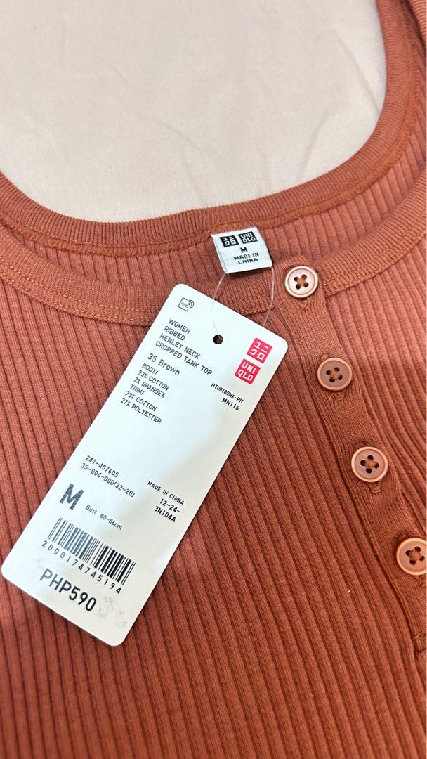 Uniqlo Cropped Tank Top (Category: Sleeveless) located in Caloocan City. Submitted by katyanne (Listing ID 1316960631, Image 2). Description: RIBBED HENLEY NECK CROPPED TANK TOP Size M Brown RFS: Not my size.
