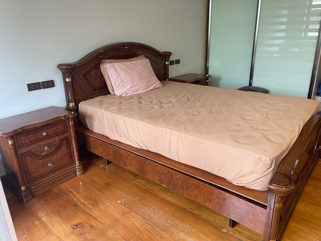 Wood Queen Bed Frame with Nightstands Set (Category: Bed Frames & Mattresses) located in Manila. Submitted by act92 (Listing ID 1316882191, Image 1). Description: Real solid wood bedframe with nightstands sets Used but not abused, you can see pics for minor scratches or chips One of the nightstands has a small damage on top, but it’s still functional. Please see pic for reference Nightstands have 3 drawers each Buyer to arrange pick up.