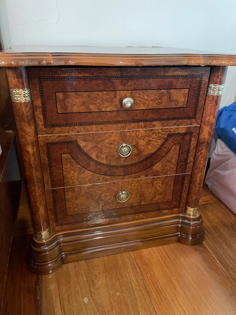 Wood Queen Bed Frame with Nightstands Set (Category: Bed Frames & Mattresses) located in Manila. Submitted by act92 (Listing ID 1316882191, Image 3). Description: Real solid wood bedframe with nightstands sets Used but not abused, you can see pics for minor scratches or chips One of the nightstands has a small damage on top, but it’s still functional. Please see pic for reference Nightstands have 3 drawers each Buyer to arrange pick up.