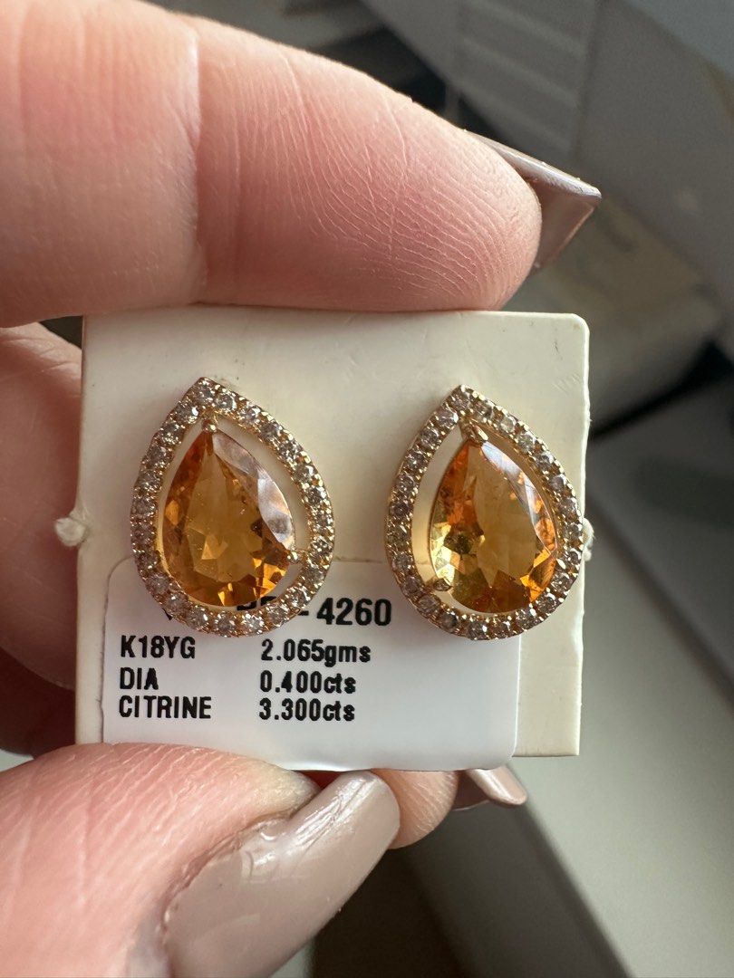 18k gold earrings (Category: Earrings) located in Singapore. Submitted by gemsandjewelry (Listing ID 1317028362, Image 2). Description: Old price Sale sale sale………..18k Japan gold details in the picture is a real natural diamond and 3.300 carat cetrin stone..can negotiate .