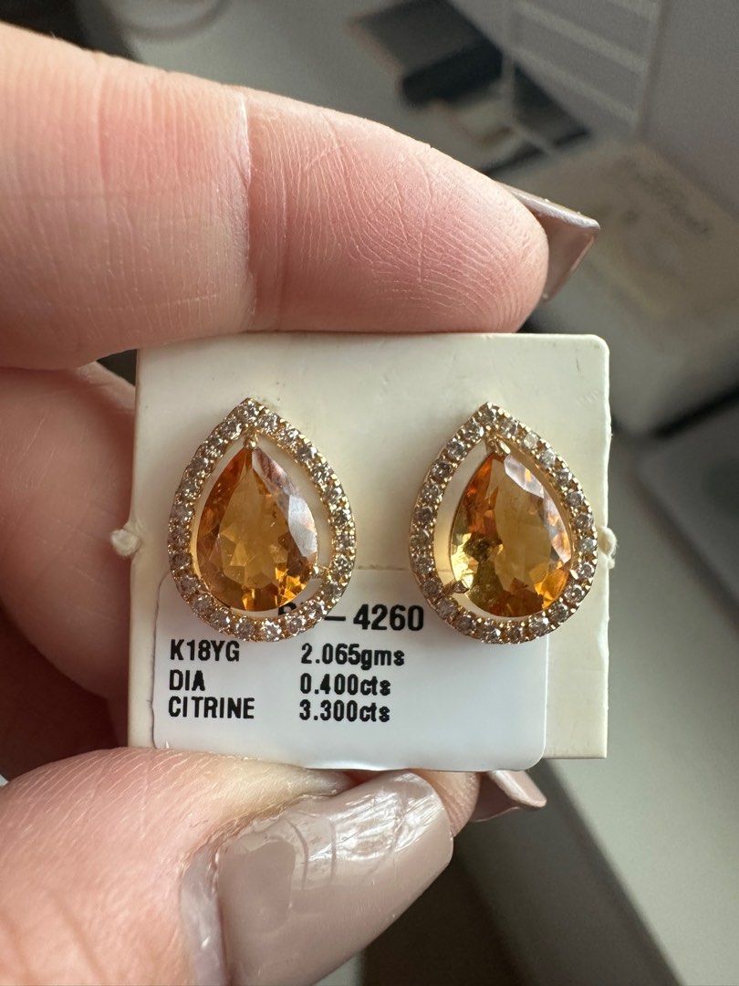18k gold earrings (Category: Earrings) located in Singapore. Submitted by gemsandjewelry (Listing ID 1317028362, Image 1). Description: Old price Sale sale sale………..18k Japan gold details in the picture is a real natural diamond and 3.300 carat cetrin stone..can negotiate .