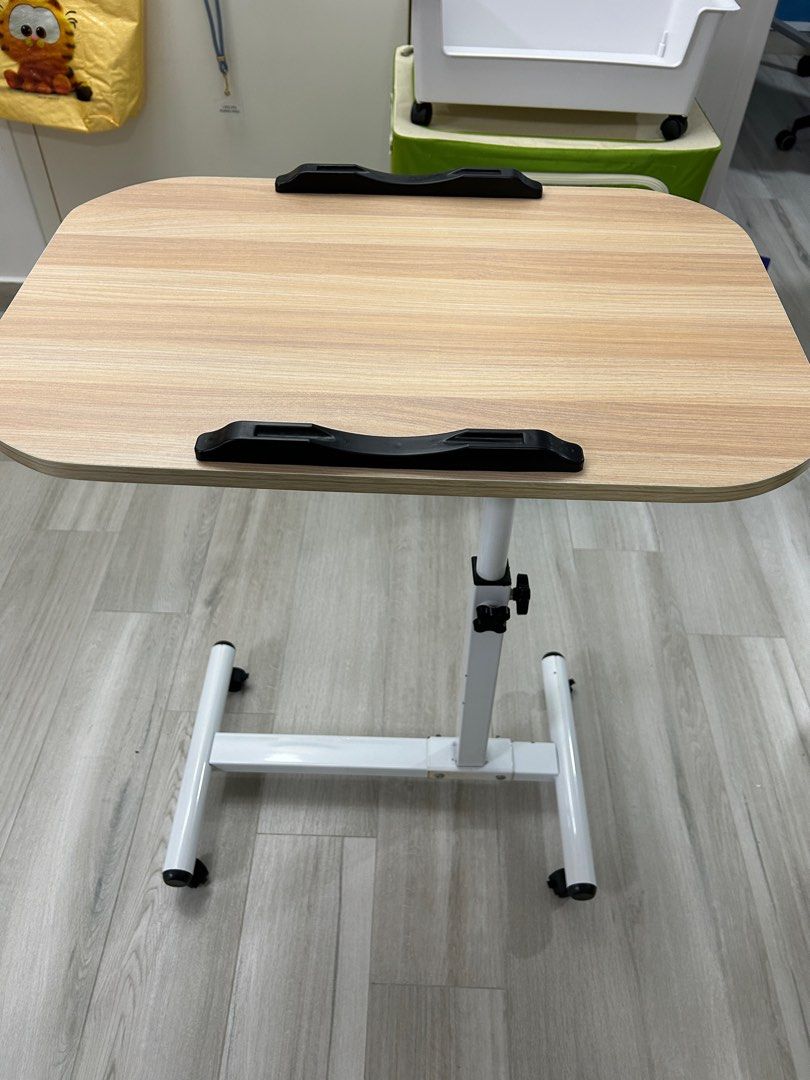 Adjustable table (Category: Tables & Sets) located in Singapore. Submitted by jasonchia762 (Listing ID 1317144689, Image 1). Description: Adjustable table. Lightly used. 1.5years old..
