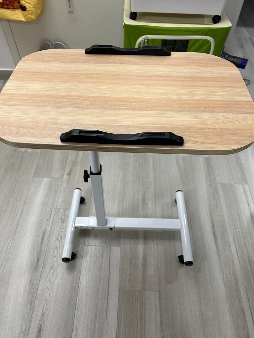 Adjustable table (Category: Tables & Sets) located in Singapore. Submitted by jasonchia762 (Listing ID 1317144689, Image 3). Description: Adjustable table. Lightly used. 1.5years old..