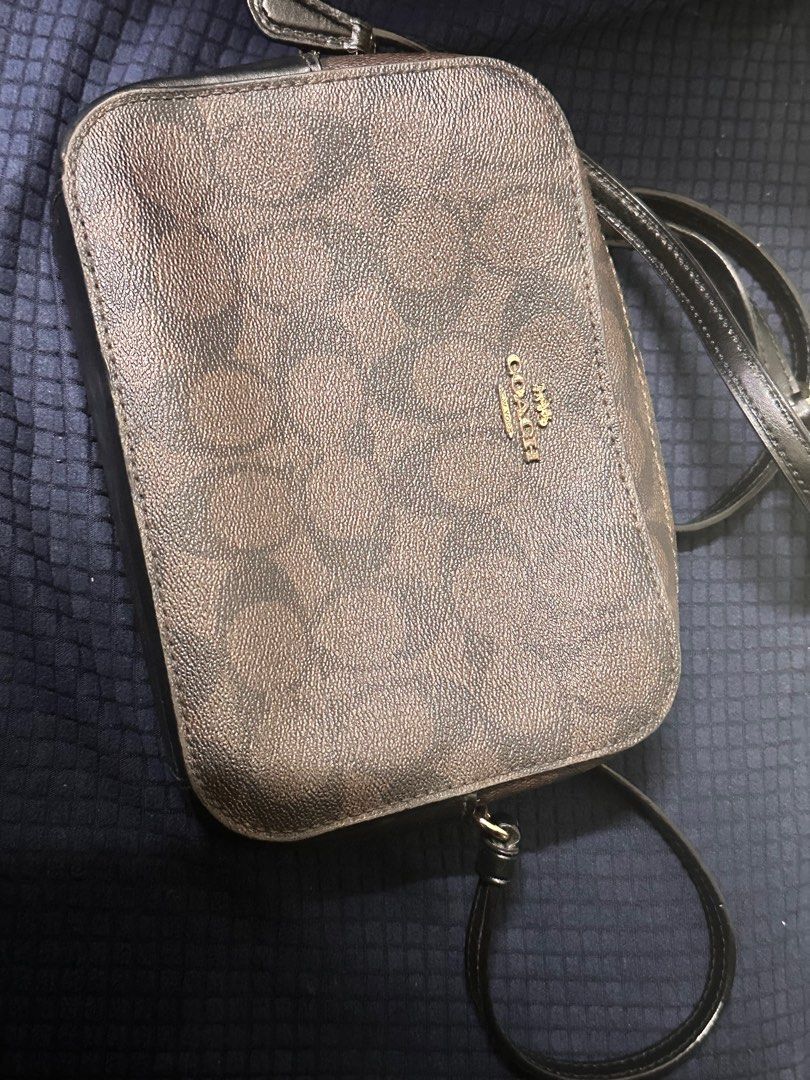Coach Mini Camera Bag (Category: Luxury Bags & Wallets) located in Marikina City. Submitted by prelovedshopbyj (Listing ID 1317145949, Image 1). Description: RFS: Decluttering. Bought from Coach Outlet. - Adjustable strap with 23” drop for shoulder or crossbody wear - 71/4” (L) x 51/4” (H) x 2” (H).