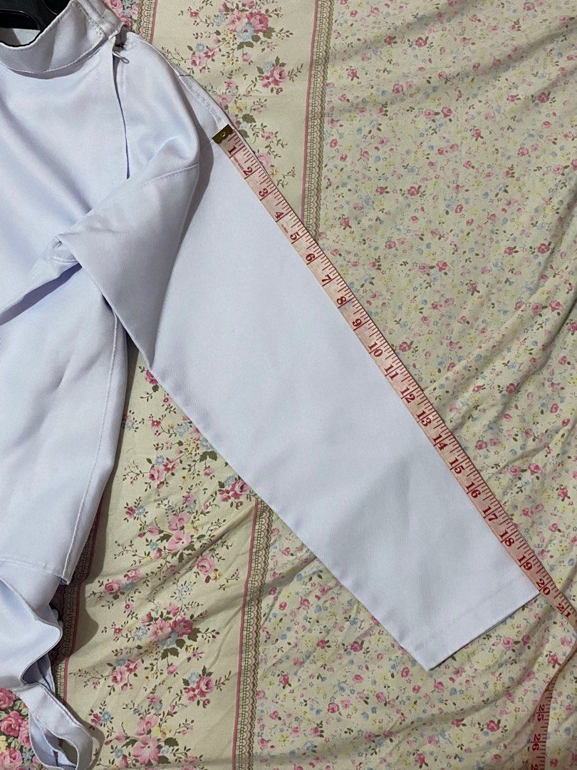 Fencing jacket - right handed (unbranded) (Category: Other Sports Equipment and Supplies) located in Paranaque City. Submitted by daechwi7a (Listing ID 1317111101, Image 3). Description: Used for only a semester of PE. There are 3 small, visible stains from playing but I think they can easily be scrubbed off! Measurements are shown in the pictures. It has an adjustable strap at the bottom so it can extend for another 21 inches. Please manage your