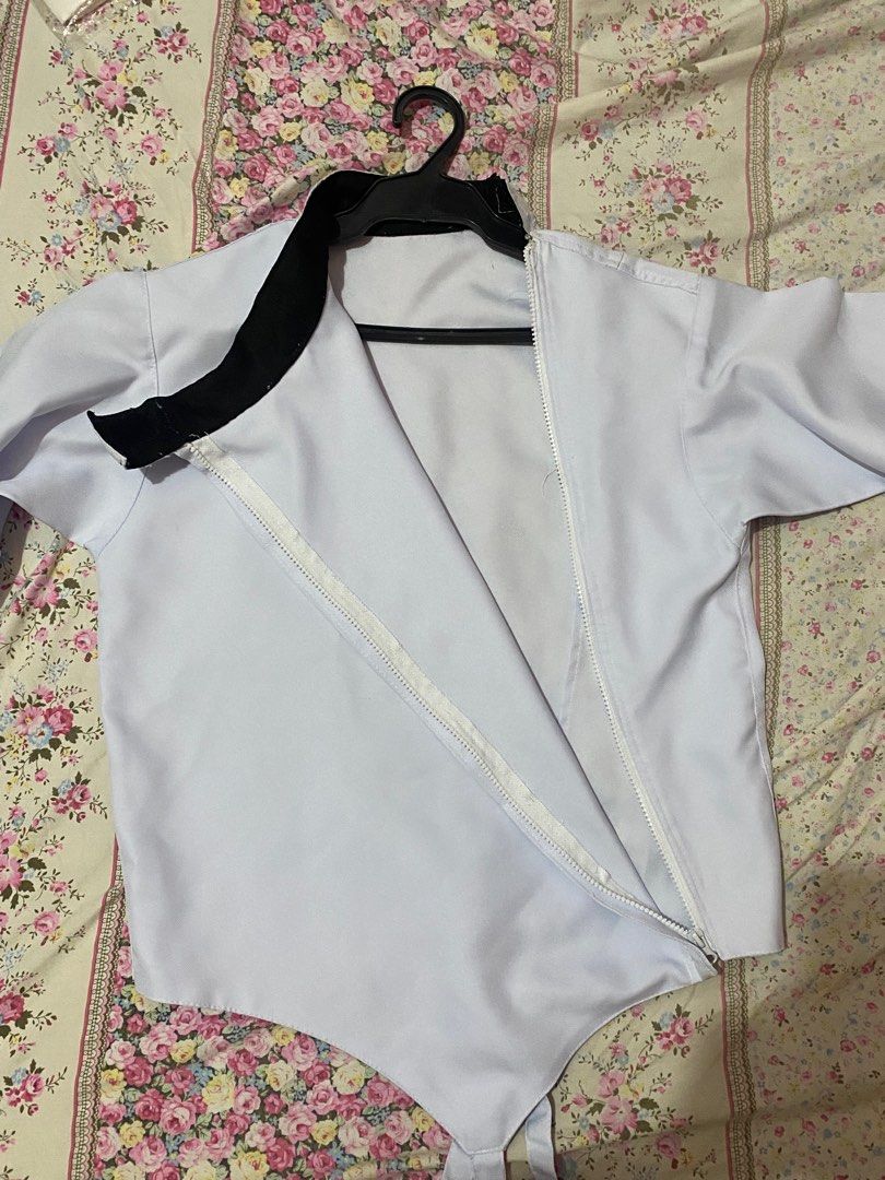 Fencing jacket - right handed (unbranded) (Category: Other Sports Equipment and Supplies) located in Paranaque City. Submitted by daechwi7a (Listing ID 1317111101, Image 1). Description: Used for only a semester of PE. There are 3 small, visible stains from playing but I think they can easily be scrubbed off! Measurements are shown in the pictures. It has an adjustable strap at the bottom so it can extend for another 21 inches. Please manage your