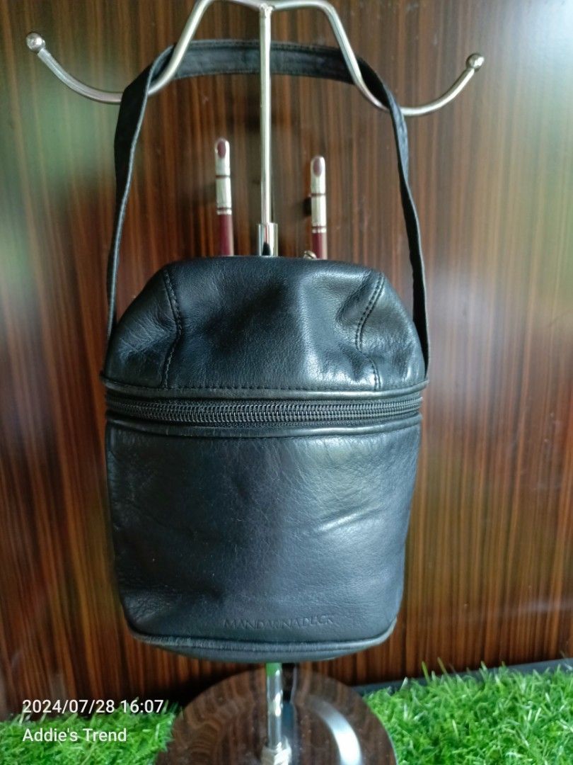 Free Mandarina duck leather mini handbag (Category: Purses & Pouches) located in Subic. Submitted by addiestrend (Listing ID 1317178323, Image 1). Description: Free with any purchase from my listings. Has minor sign of use Available as long as it is posted.