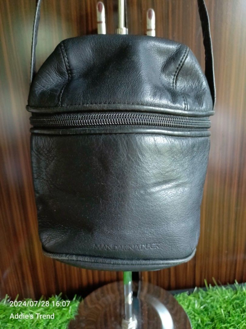 Free Mandarina duck leather mini handbag (Category: Purses & Pouches) located in Subic. Submitted by addiestrend (Listing ID 1317178323, Image 2). Description: Free with any purchase from my listings. Has minor sign of use Available as long as it is posted.