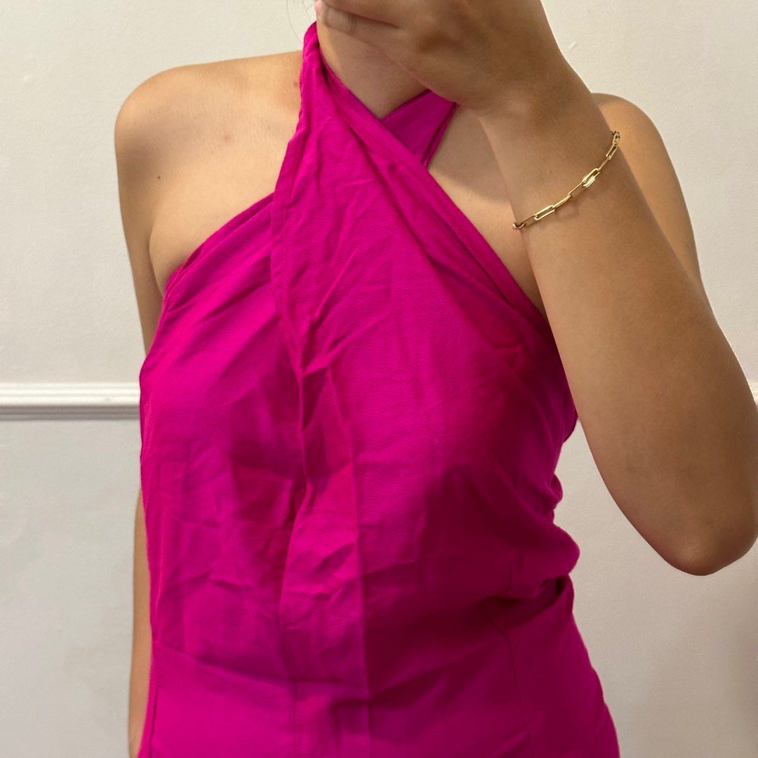 Fuchsia pink multiway linen mini dress (Category: Dresses) located in Tarlac. Submitted by shopsushibaby (Listing ID 1317172529, Image 2). Description: Honestly so hard to let go. Would rather keep than sell low. High quality linen! Can be worn in so many ways. Runs a bit large but can be adjusted with the straps. For reference, height is 5’4” and waistline is 27”. Accepted payment methods are Metrobank and GCash..