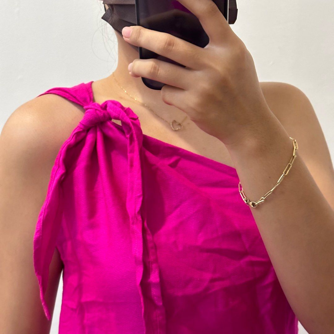 Fuchsia pink multiway linen mini dress (Category: Dresses) located in Tarlac. Submitted by shopsushibaby (Listing ID 1317172529, Image 3). Description: Honestly so hard to let go. Would rather keep than sell low. High quality linen! Can be worn in so many ways. Runs a bit large but can be adjusted with the straps. For reference, height is 5’4” and waistline is 27”. Accepted payment methods are Metrobank and GCash..