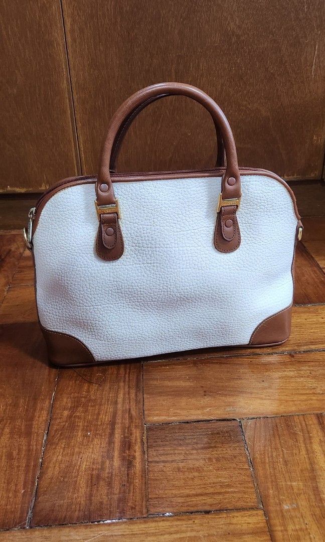 Guess Vintage Bag (Category: Purses & Pouches) located in Marikina City. Submitted by MSS_32 (Listing ID 1317013961, Image 2). Description: * Will be given as free with any 2 bag purchase * Leather conditioned with clean interior * with signs of use on zipper handle * Leather is nice as this is a vintage Guess bag *MOP: Gcash/BPI * SF c/o buyer.