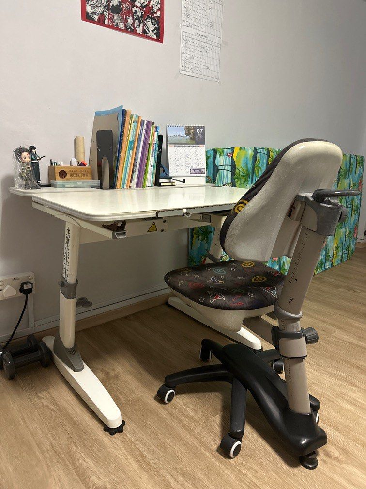 Study Table (Category: Tables & Sets) located in Singapore. Submitted by wheezz (Listing ID 1317155671, Image 1). Description: Height adjustable study table and ergonomic chair. Suitable for young children from 6 year old to 12 year old. Ergonomics is important for a growing child. This height-adjustable table is the perfect desk for your child who is growing. Price is for a set. If need either only , do contact me to negotiate price. Thanks!.