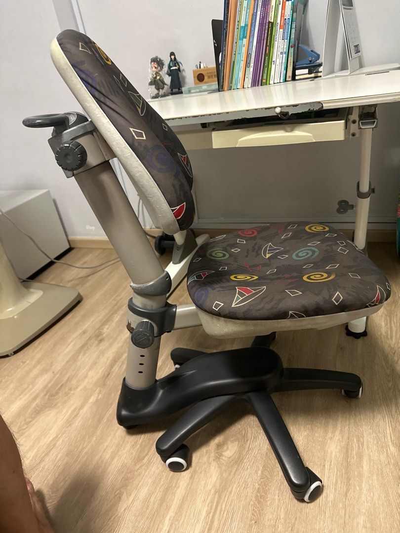 Study Table (Category: Tables & Sets) located in Singapore. Submitted by wheezz (Listing ID 1317155671, Image 2). Description: Height adjustable study table and ergonomic chair. Suitable for young children from 6 year old to 12 year old. Ergonomics is important for a growing child. This height-adjustable table is the perfect desk for your child who is growing. Price is for a set. If need either only , do contact me to negotiate price. Thanks!.