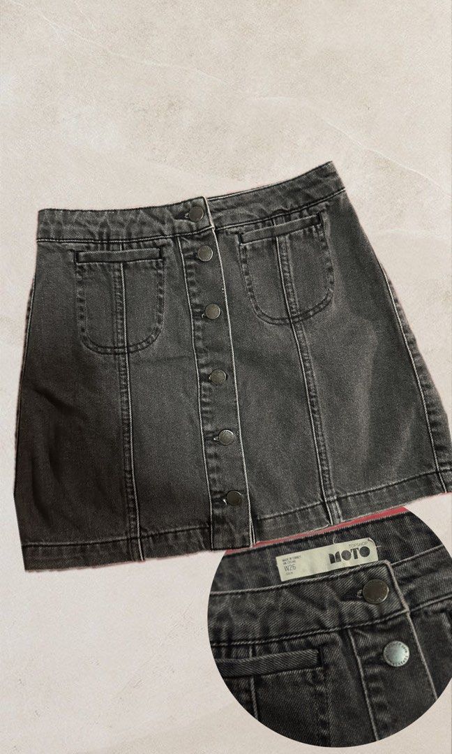 TOPSHOP MOTO Denim Skirt Button Front (Category: Skirts) located in Pasig City. Submitted by nclsmx (Listing ID 1317063732, Image 1). Description: Brand: TOPSHOP Bought for 1.4k before at Topshop Powerplant Mall Rockwell Price nego! Size: 26 waist Length: 15.25cm Color: Washed Black Material: Denim .