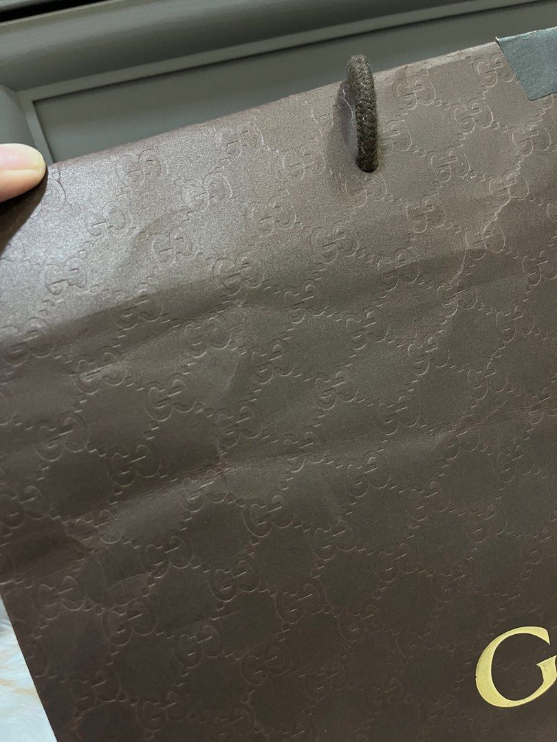 Authentic Gucci Embosed Paperbag (Category: Luxury Bags & Wallets) located in Quezon City. Submitted by jewelraestoyshop (Listing ID 1312225738, Image 3). Description: Authentic Gucci Embossed Paperbag Large ₱400 Location: Project 4, QC.