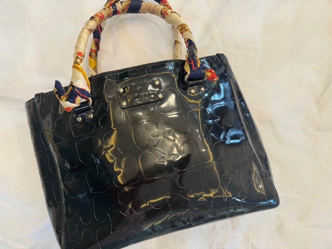 Original Kate Spade shoulder bag (Category: Shoulder Bags) located in Roxas City. Submitted by joypejay (Listing ID 1312177727, Image 3). Description: Authentic Kate spade medium sized bag. Long folder in picture for size reference. Lightly used. The handles have mild rubbings thus the free twilly. Inside of bag is clean. RFS: too many bags Payment mode: gcash or Bpi fund transfer Shipping thru LbC or J&T No free shipping Shipping fee to be shoul