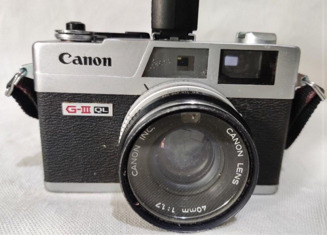 Canon Canonet QL17 GIII (Category: Cameras) located in Quezon City. Submitted by murpeno (Listing ID 1312229444, Image 2). Description: Selling this camera for a friend. -Untested but in good body condition. -Filter SOLD already. -Needs CLA. -Lens has dust needs cleaning. Selling AS IS. Add 1,000 if the buyer prefer that I CLA this Camera. .