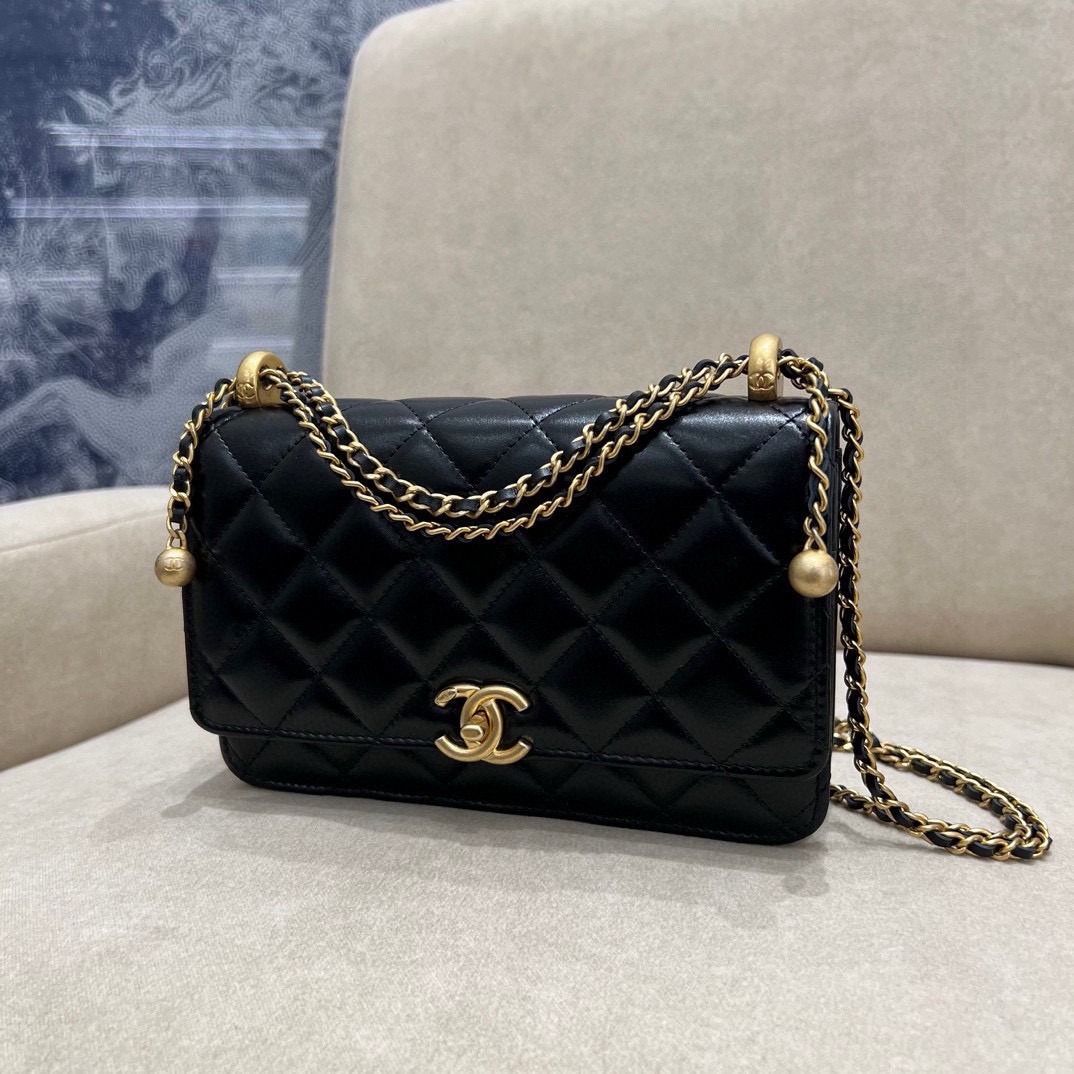 Chanel woc with gold ball sale