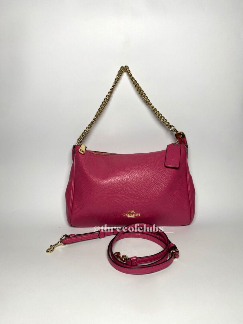 Coach Ruby Pink Leather Chain Two Way Bag (Category: Luxury Bags & Wallets) located in Quezon City. Submitted by threeofclubs__ (Listing ID 1312275423, Image 1). Description: Very good condition 100% GA Clean body with slight sign of usage, check last photo Clean interior Nice chain handle still gold No major rubs No stains No cracks Normal signs of usage always double check and zoom photos Aproximate dimensions: 11.0" L x 7.0" H ♣ 1 day reservat