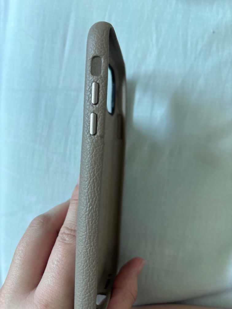 Authentic Iphone 11 leather case Casetify (Category: Cases & Sleeves) located in Quezon City. Submitted by risse_declutters (Listing ID 1317219854, Image 2). Description: Has bended crease all over the volume buttons.