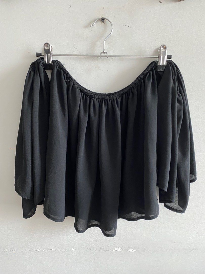 Black off shoulder top (Category: Sleeveless) located in Quezon City. Submitted by vanirish (Listing ID 1317252994, Image 1). Description: black offshoulder top. Well used but with care. Breathable cloth .