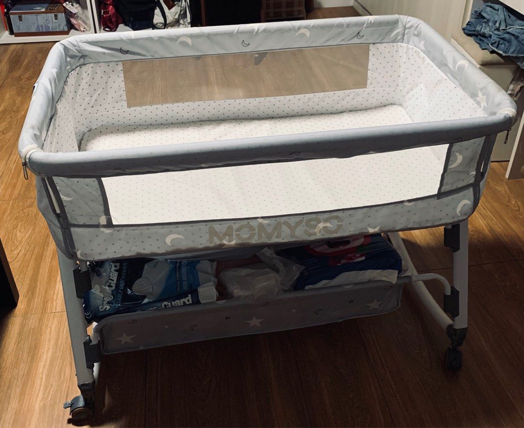 Multifunctional Co-Sleeper with FREEBIES (Category: Cots & Cribs) located in Pasig City. Submitted by jalo.vault (Listing ID 1317272323, Image 1). Description: Multifunctional Crib/Bassinet Small and Compact for Little Spaces Newborn to 3yrs old Functions ~ 1. co-sleeper since removable one side 2. can turn to rocking bed 3. mosquito net cover 4. anti-split by adjusting the height 5. storage 6. stable wheel lock Parts ~ *crib *memory foam mattres