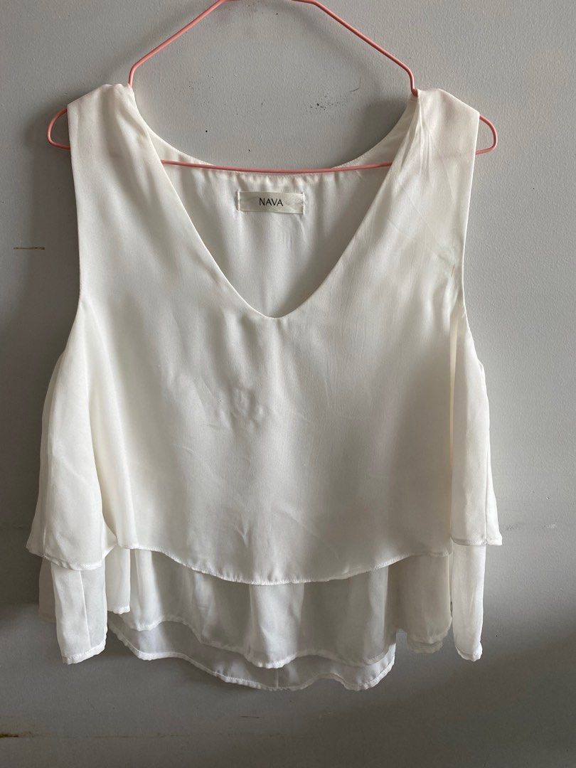 Nava White top (Category: Blouses) located in Quezon City. Submitted by vanirish (Listing ID 1317281521, Image 1). Description: Bought in the penthouse at UPTC. Minimally used .