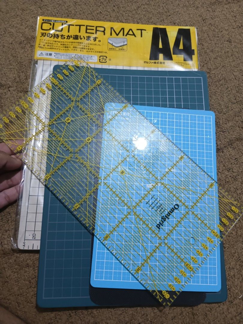 Set pack of cutting mats (Category: Craft Supplies & Tools) located in Quezon City. Submitted by markgolveo (Listing ID 1317340967, Image 1). Description: Set pack of cutting mats free large guide ruler.
