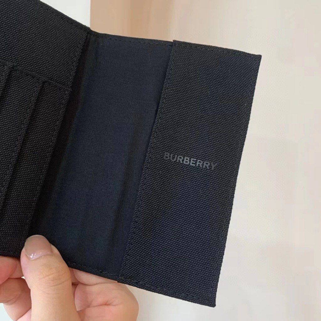 B U R B E R R Y Passport holder Men s Fashion Watches Accessories Accessory Holder Box Organizers on Carousell