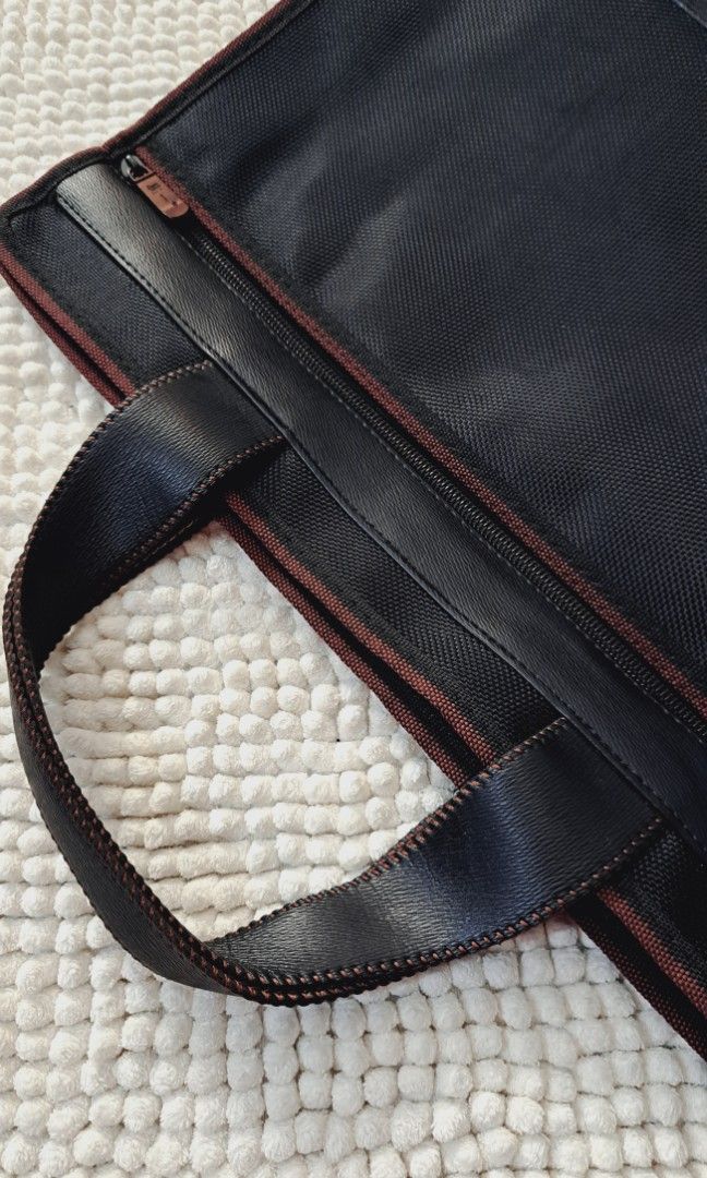 Document Bag Laptop Bag (Category: Laptop Bags & Sleeves) located in Quezon City. Submitted by kirstenbella (Listing ID 1317466442, Image 1). Description: Thick Nylon and leather material very sturdy like brandnew in actual can fit legal size folder perfect fit for laptop as well H 12 x W 14.5 x D 3 Inches NO Issues Pristine condition Gandara nito besh 📞 You may reach me through: Text, RCS, Vib@r, Telegr@m, or Wh@tsApp using the number listed in