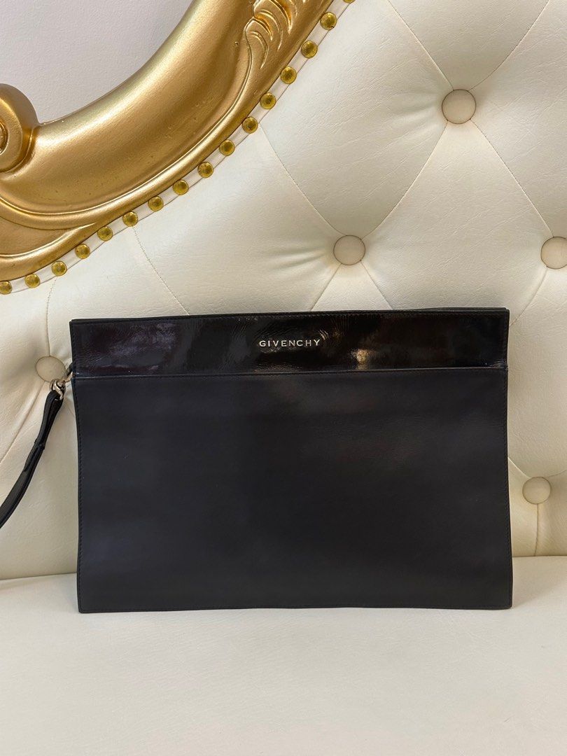 Givenchy Clutch (Category: Luxury Bags & Wallets) located in Imus. Submitted by purgingmycloset888 (Listing ID 1317534684, Image 1). Description: 🎀Slightly Negotiable ❌NO LOW BALLERS / Too much Tawad 😂 Comes with dustbag.
