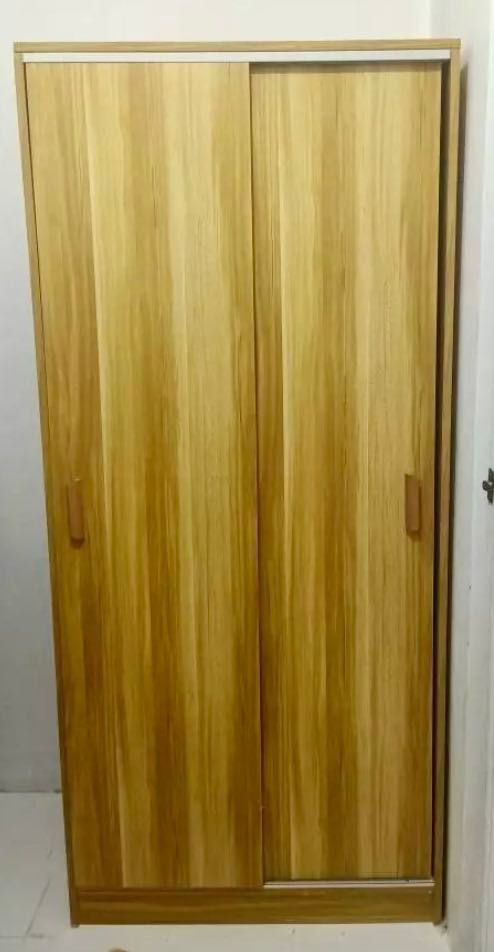 Japanese Style Modern Bedroom Wardrobe Clothing Closet Cabinet with Sliding Doors 80cm (Category: Shelves, Cabinets & Racks) located in Malabon City. Submitted by ty.samuelchristian (Listing ID 1317411224, Image 2). Description: - Perfect cabinet for a condominium or apartment living area - Door Opening and Closing Mode: Sliding Doors - With Hanger Bar - Sturdy design made from MDF for a long-lasting addition to your home. - This cabinet is very 