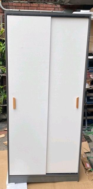 Japanese Style Modern Bedroom Wardrobe Clothing Closet Cabinet with Sliding Doors 80cm (Category: Shelves, Cabinets & Racks) located in Malabon City. Submitted by ty.samuelchristian (Listing ID 1317411224, Image 1). Description: - Perfect cabinet for a condominium or apartment living area - Door Opening and Closing Mode: Sliding Doors - With Hanger Bar - Sturdy design made from MDF for a long-lasting addition to your home. - This cabinet is very 
