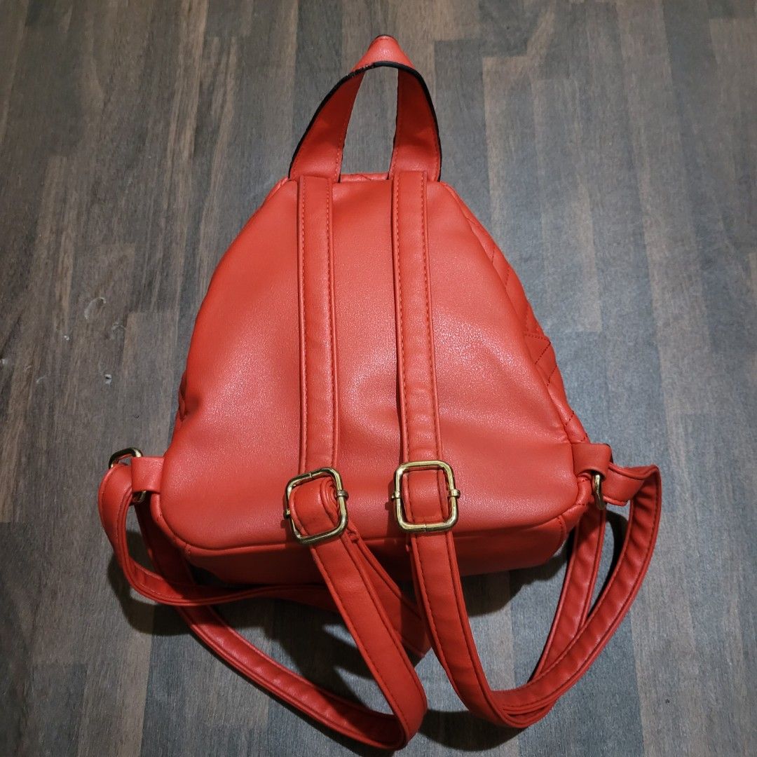 Kiss me couture backpack best sale