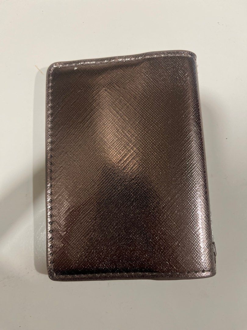 Mango Card Holder Platinum color Saffiano effect leather (Category: Wallets & Card Holders) located in Marikina City. Submitted by marz.25 (Listing ID 1317468274, Image 2). Description: 3 inches width by 4 inches height Actual Cardholder inside looks new Shiny looking manageable tastas na tahi.