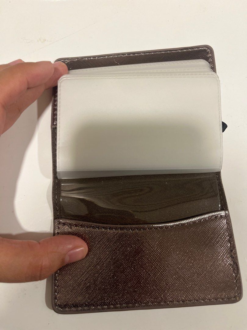 Mango Card Holder Platinum color Saffiano effect leather (Category: Wallets & Card Holders) located in Marikina City. Submitted by marz.25 (Listing ID 1317468274, Image 3). Description: 3 inches width by 4 inches height Actual Cardholder inside looks new Shiny looking manageable tastas na tahi.