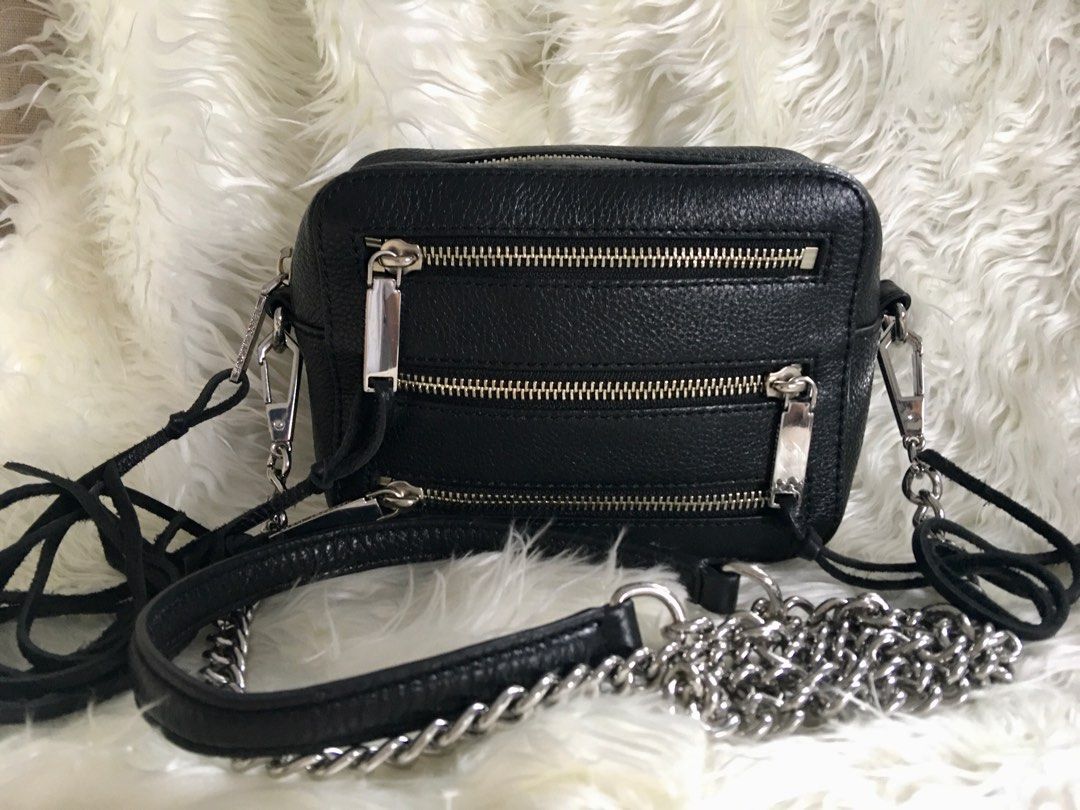 Rebecca Minkoff 4 Zip Moto camera bag (Category: Luxury Bags & Wallets) located in Siniloan. Submitted by treyyasonlineshop (Listing ID 1317398515, Image 1). Description: Mini size Can fit promax phone.